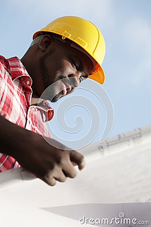 Reading construction plans Stock Photo