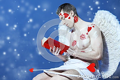 Reading Cupid Stock Photo