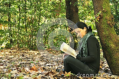 Reading in nature is my hobby Stock Photo