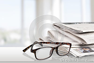 Reading Newspapers Stock Photo