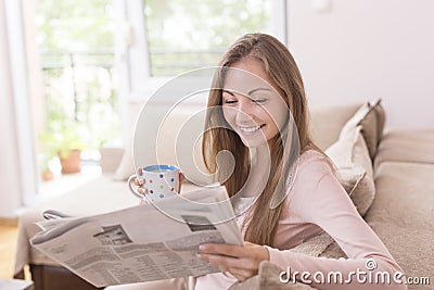 Reading the newspapers Stock Photo