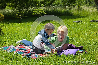 Reading outdoors Stock Photo