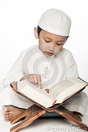 Reading the Quran Stock Photo