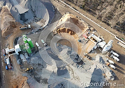 Ready mix concrete batching plant. Producing Ñoncrete and portland cement mortar for construction and formworks. Pouring concrete Stock Photo