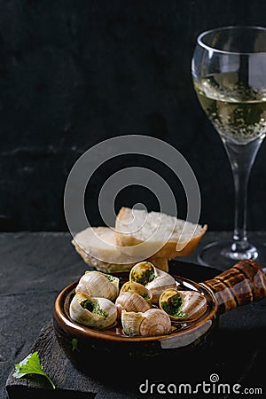 Ready to eat Escargots de Bourgogne snails Stock Photo