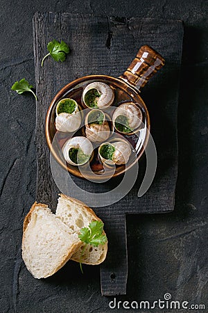 Ready to eat Escargots de Bourgogne snails Stock Photo