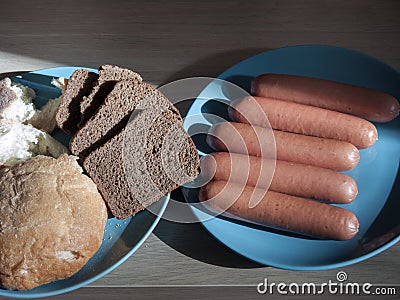 Sausages And Bread Stock Photo