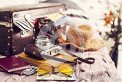 Ready vacation suitcase on bed Stock Photo