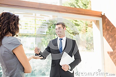 Real-estate agent giving keys Stock Photo