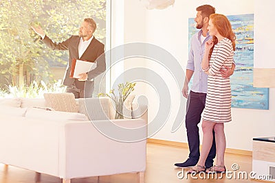 Real estate agent showing view Stock Photo