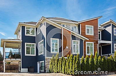 Real Estate Exterior Front House on a sunny day Big custom made luxury house with nicely landscaped front yard Editorial Stock Photo