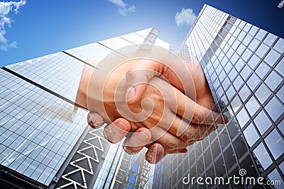 Real estate transaction closing with business people shaking hands Stock Photo