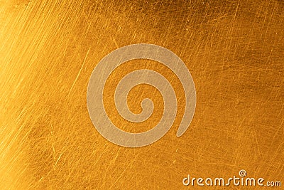 Real gold scratched metal texture Stock Photo