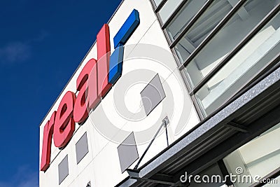 Real sign branch in Cuxhaven, Germany Editorial Stock Photo