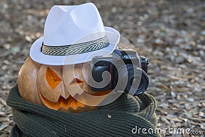 Real orange halloween pumpkin with carving Editorial Stock Photo