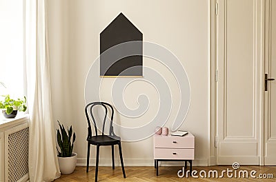 Real photo of a living room interior, blackboard on the wall Stock Photo