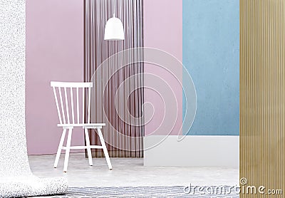 Real photo of a white lamp above wooden chair in spacious interior with pastel blue and pink walls as well as plastic screens Stock Photo