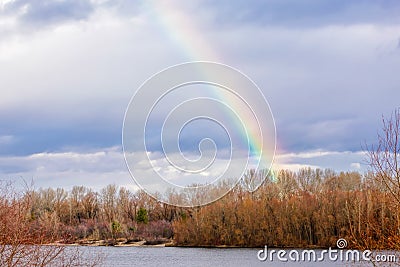 Real Rainbow Over the River Stock Photo