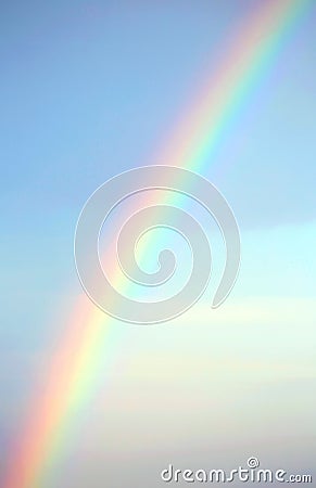 Real rainbow after the storm and the blue sky Stock Photo