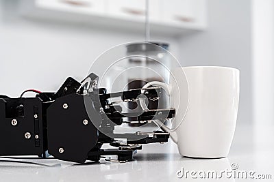 Real robot hand and white cup of coffee. Concept of robotic process automation Stock Photo