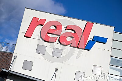 Real sign branch in Cuxhaven, Germany Editorial Stock Photo