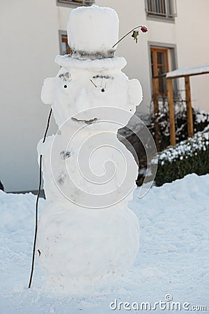 Real snowman - creatively decorated Stock Photo