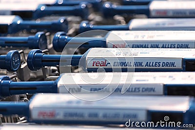 Real supermarket shopping cart signs near siegen germany Editorial Stock Photo