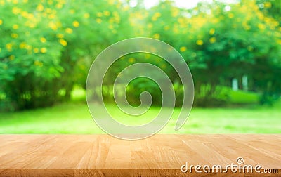 Real wood table top texture on leaf tree garden background Stock Photo