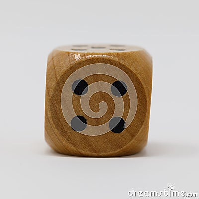 Real Wooden Die 4 spot Stock Photo