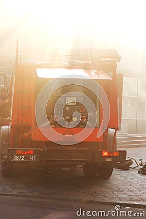 The real work of firefighters at the scene. Extinguishing a burning building Editorial Stock Photo