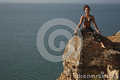 Real yoga instructor practicing Stock Photo