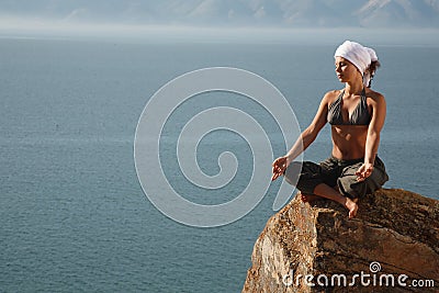 Real yoga instructor practicing Stock Photo