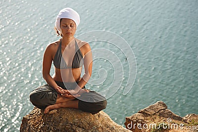 Real yoga instructor practicing Stock Photo