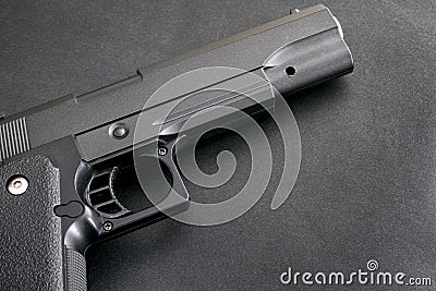 Realistic airsoft gun on black background Stock Photo