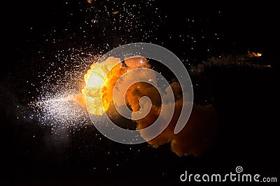 Realistic fiery explosion over a black background Stock Photo