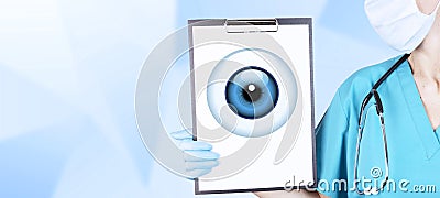 Realistic human eye with a blue cornea in the form of a round icon on a tablet in the hands of a doctor, a woman in medical Stock Photo