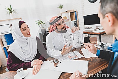 Realtor shows the layout on the sheet. Stock Photo