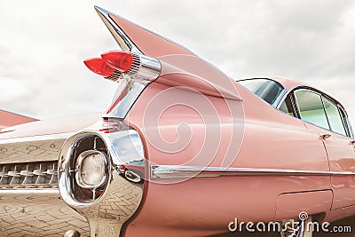 Rear end of a pink classic Cadillac car Editorial Stock Photo