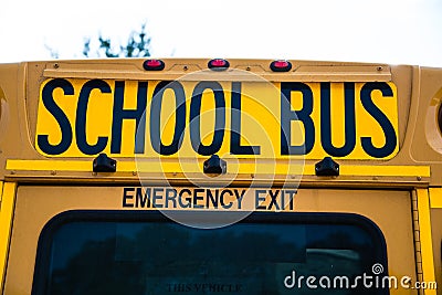 Rear of US school bus showing the Emergency Exit Stock Photo