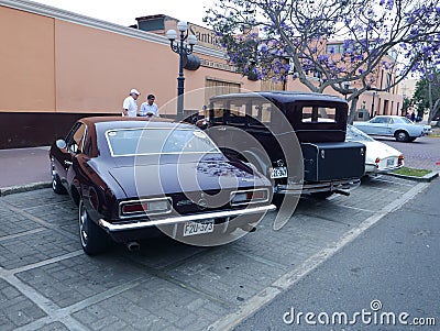 Rear vier of a maroon Chevrolet Camaro in Lima Editorial Stock Photo