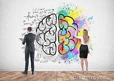 Business people drawing brain on concrete Stock Photo