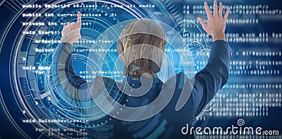 Composite image of rear view of businessman using imaginary screen interface Stock Photo