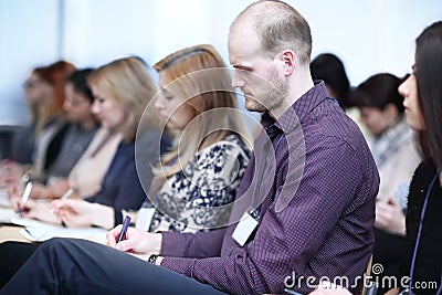 Rear view.businessmen sitting in a conference room Stock Photo