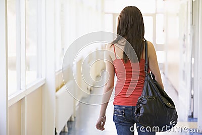 Rear view of female college student in university Stock Photo