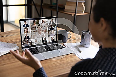 Woman have online team meeting with colleagues on laptop Stock Photo