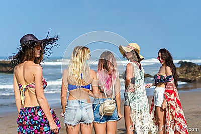 rear view of group of beautiful young women Stock Photo