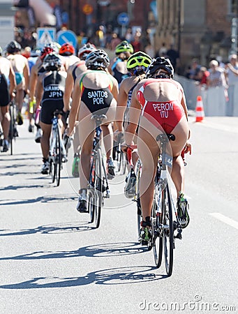 Rear view of a group of triathlete cyclists Editorial Stock Photo