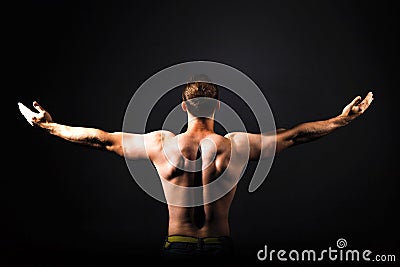 Rear view of healthy muscular young man Stock Photo