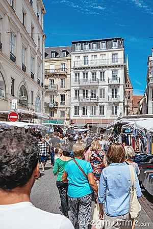 Rear view of Hundreds of people walking on the street of Strasbourg during the Editorial Stock Photo