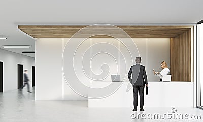 Rear view of man talking on reception Stock Photo